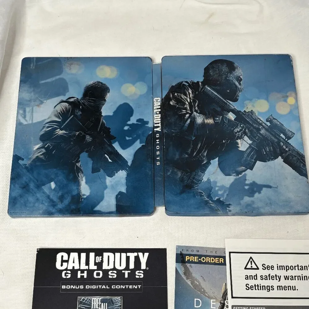 Call of Duty Ghosts (Sony PlayStation 3/4 Xbox 360/One Steelbook) Steelbook ONLY